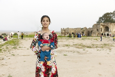 Young Turcmenic woman with baby