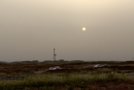 Picnic at sunset and oil field